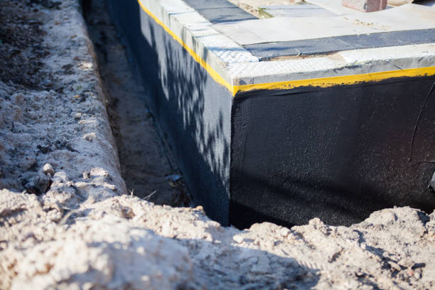 Professional Waterproofing technician working in Portage, IN